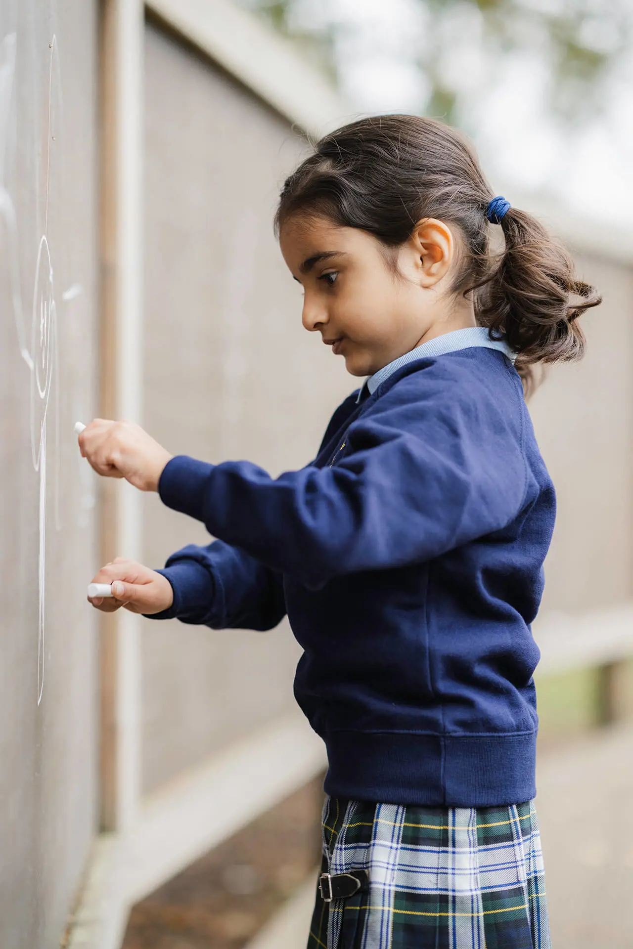 Repton Pre-Prep reception pupil enjoying outdoors learning